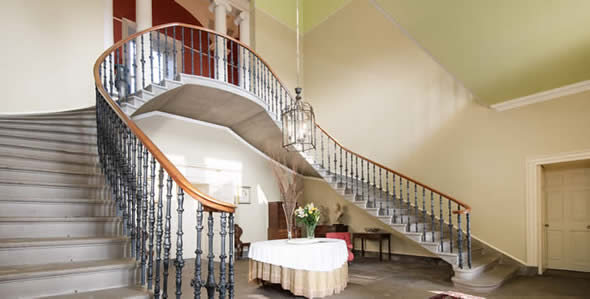The sweeping staircase at Wedderburn is the perfect place for making a grand entrance and for wedding photography